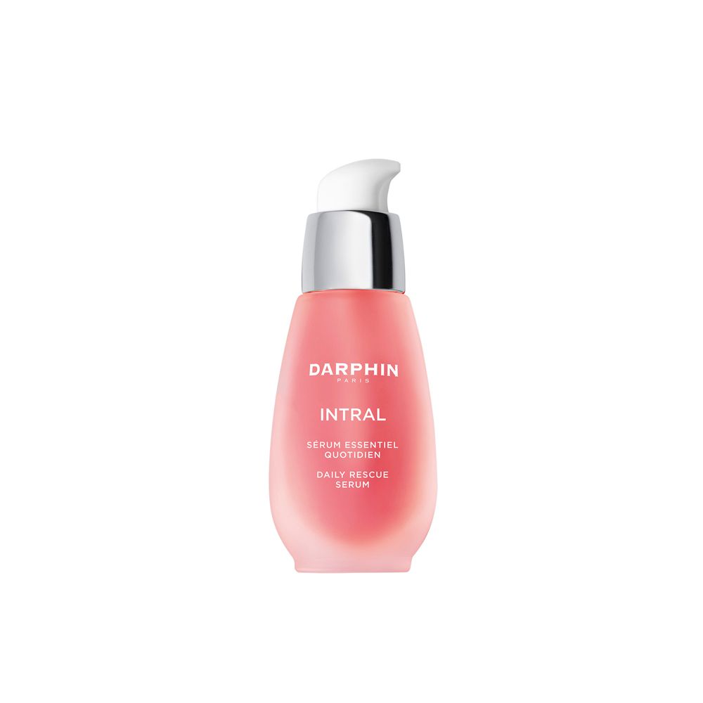 Flacon de sérum rose avec pompe argentée. Inscriptions: DARPHIN, INTRAL, Daily Rescue Serum.