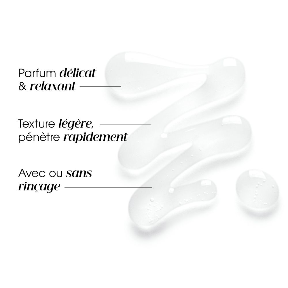 KLORANE Soin après-shampoing à la pivoine: Tube rose avec bouchon blanc, motif pivoine et informations produit à l'avant.