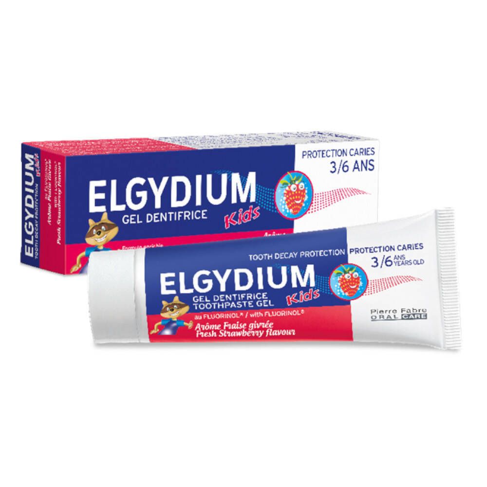 Tube et boîte de dentifrice. Tube bleu avec accent rouge, texte: ELGYDIUM Kids, goût fraise. Boîte avec le même design.