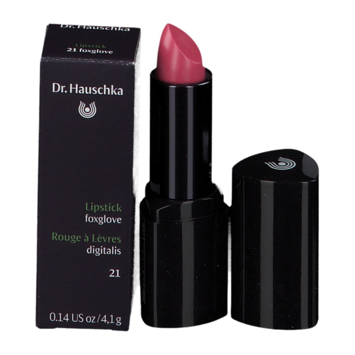 Rouge à lèvres avec emballage. Étui noir, pointe rose. Texte: Dr. Hauschka, Lipstick 21 foxglove.