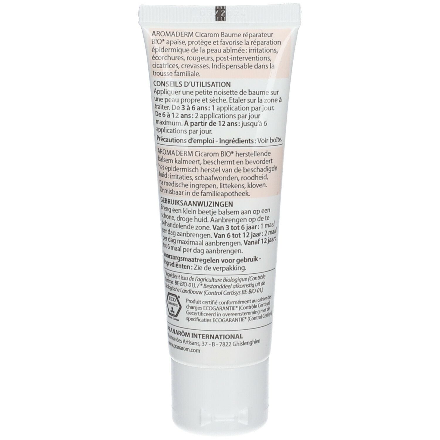 Dos du tube de crème. Informations textuelles: utilisation, ingrédients, fabricant. Fond blanc.