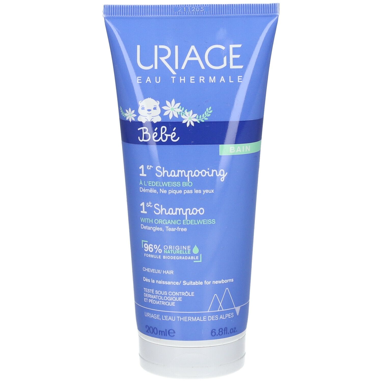Tube bleu et blanc URIAGE Bébé. Texte: 1er Shampooing, 96% ingrédients naturels. Testé dermatologiquement. Sans larmes.