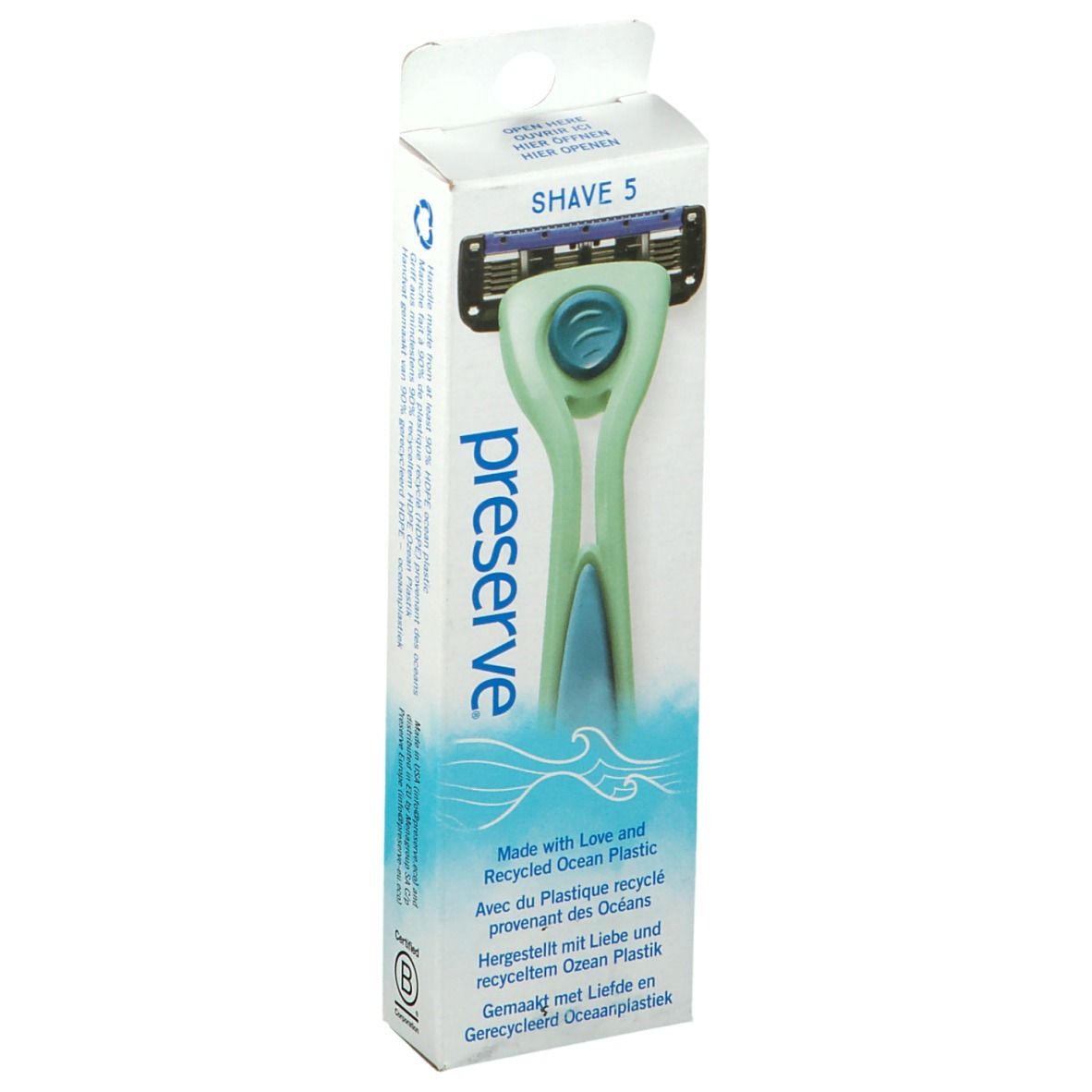 Rasoir vert dans son emballage. Marque: preserve. Produit: SHAVE 5. Emballage avec motif de vagues et texte.