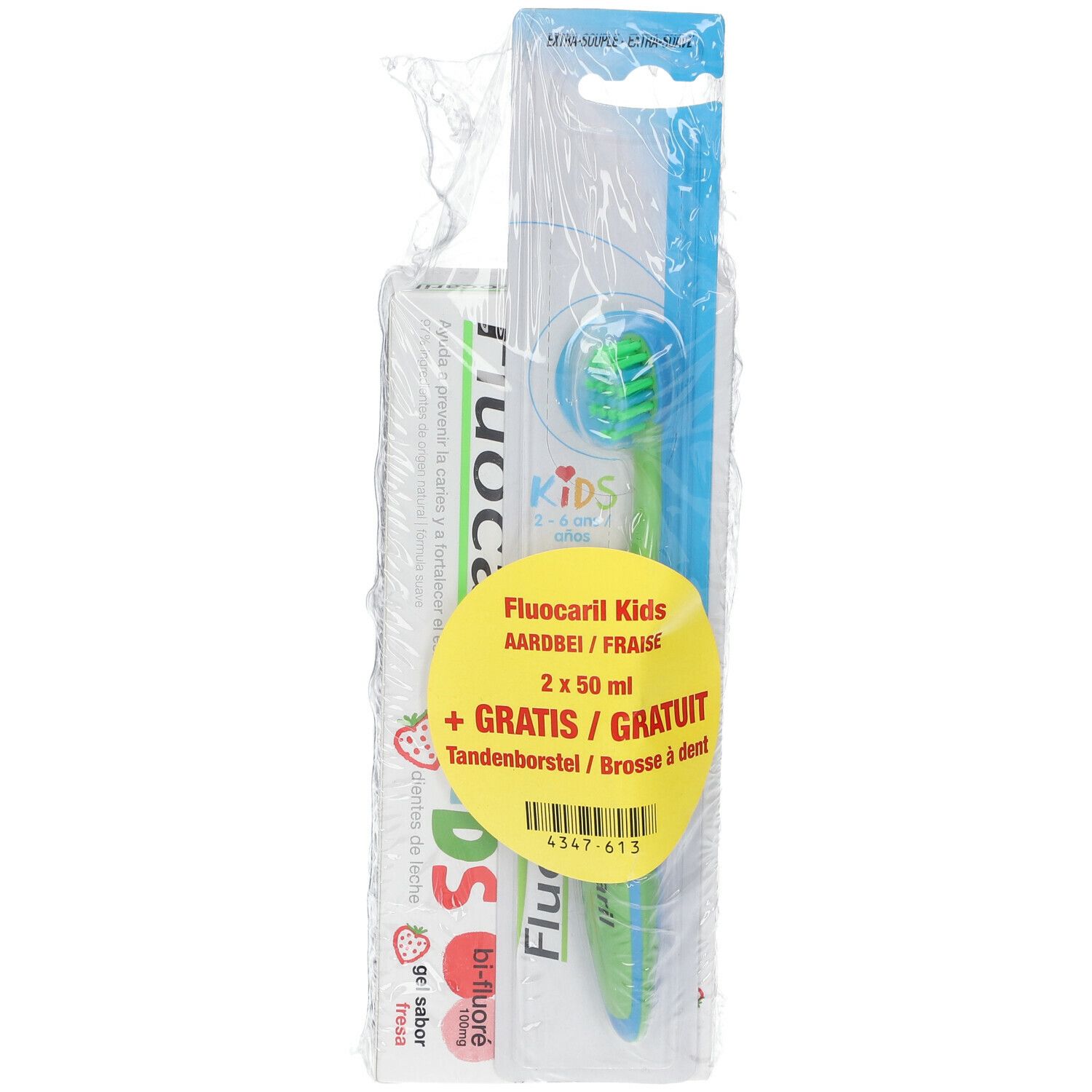 Emballage avec dentifrice et brosse à dents. Autocollant jaune avec nom du produit et "GRATUIT".