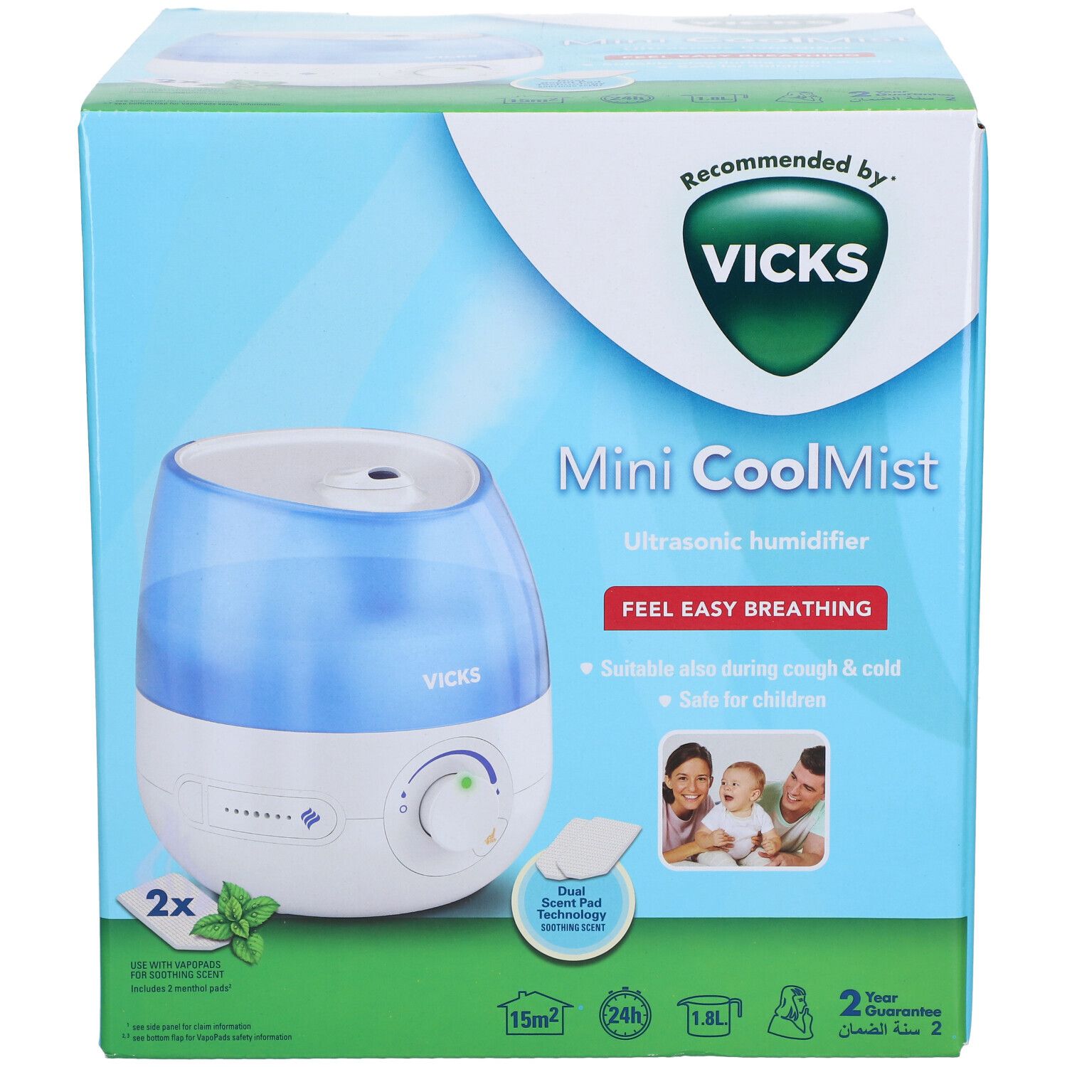 Vicks Mini CoolMist Luftbefeuchter in Verpackung. Blaue und weiße Farben, grüne Akzente. Empfohlen von Vicks. Enthält 2 Menthol-Pads.