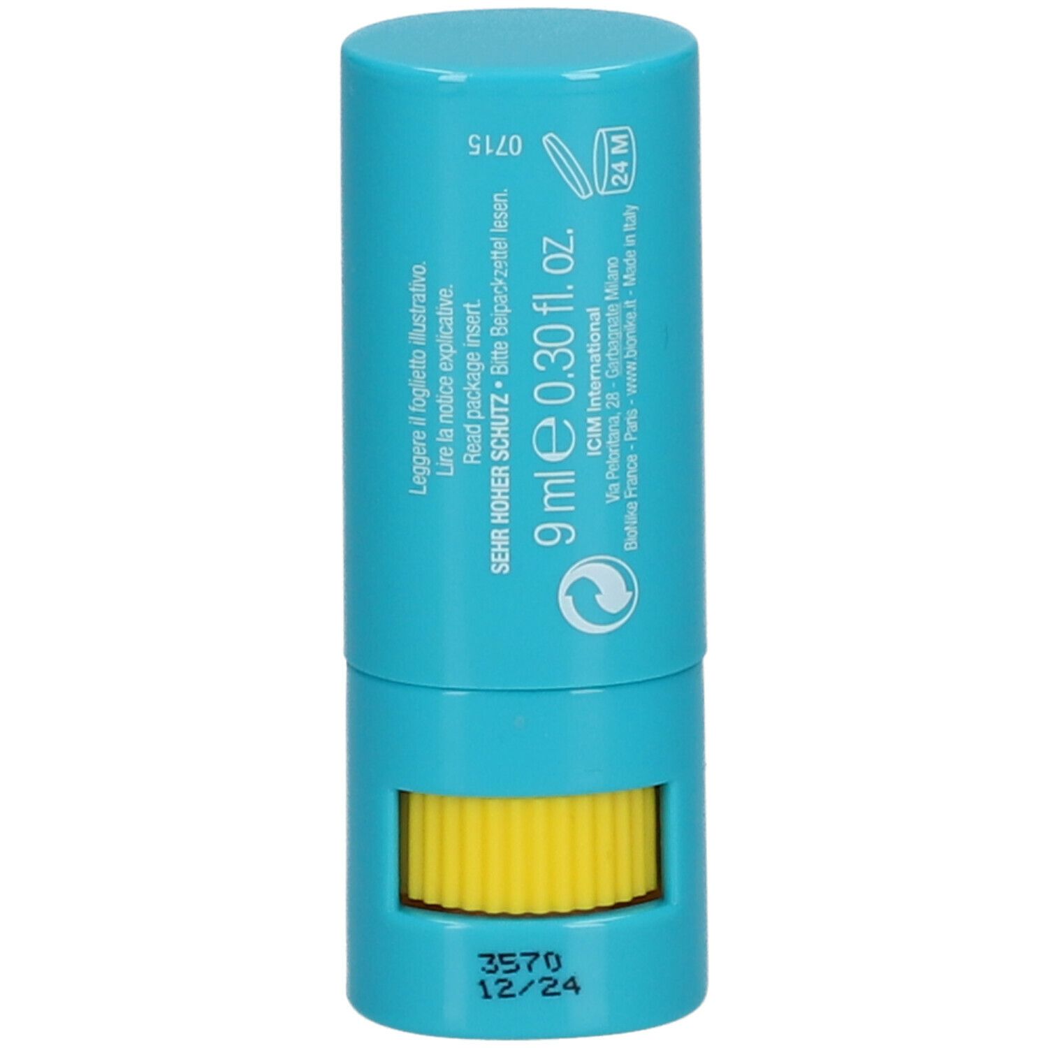 Stick bleu avec mécanisme rotatif jaune. Inscription: 9 ml e 0.30 fl. oz. Contient des informations sur les ingrédients et le fabricant.