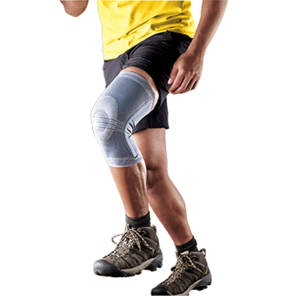 Kniebandage. Verpackung mit Produkt und Person. XL-Größe. 3M™ Futuro™ Ultra Performance Kniestütze.