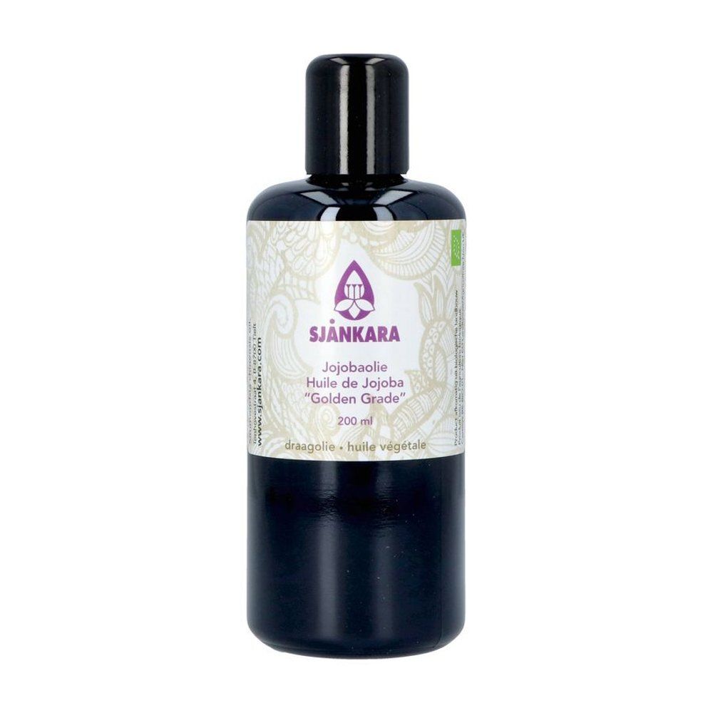 Flacon noir avec bouchon noir. Étiquette avec nom du produit, marque et label bio. Contenu : huile de jojoba.