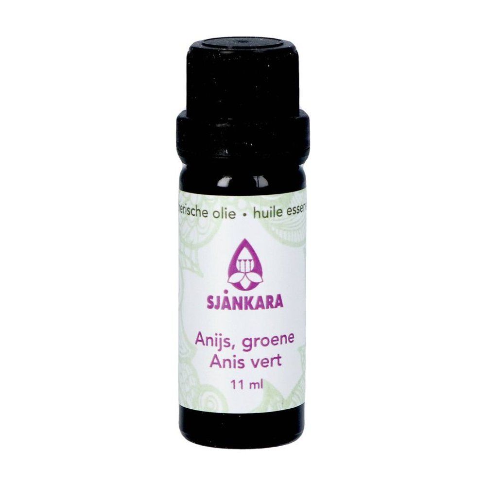 Petite bouteille d'huile essentielle. Inscription : Sjnkara, Anis vert, 11 ml. Logo et texte violets.