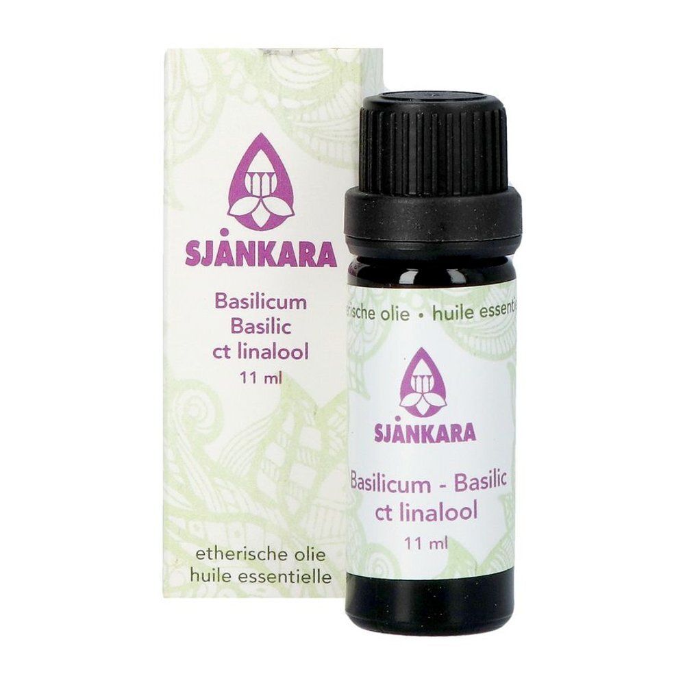 Flacon en verre brun avec bouchon noir. Étiquette avec nom du produit et logo. 11 ml.