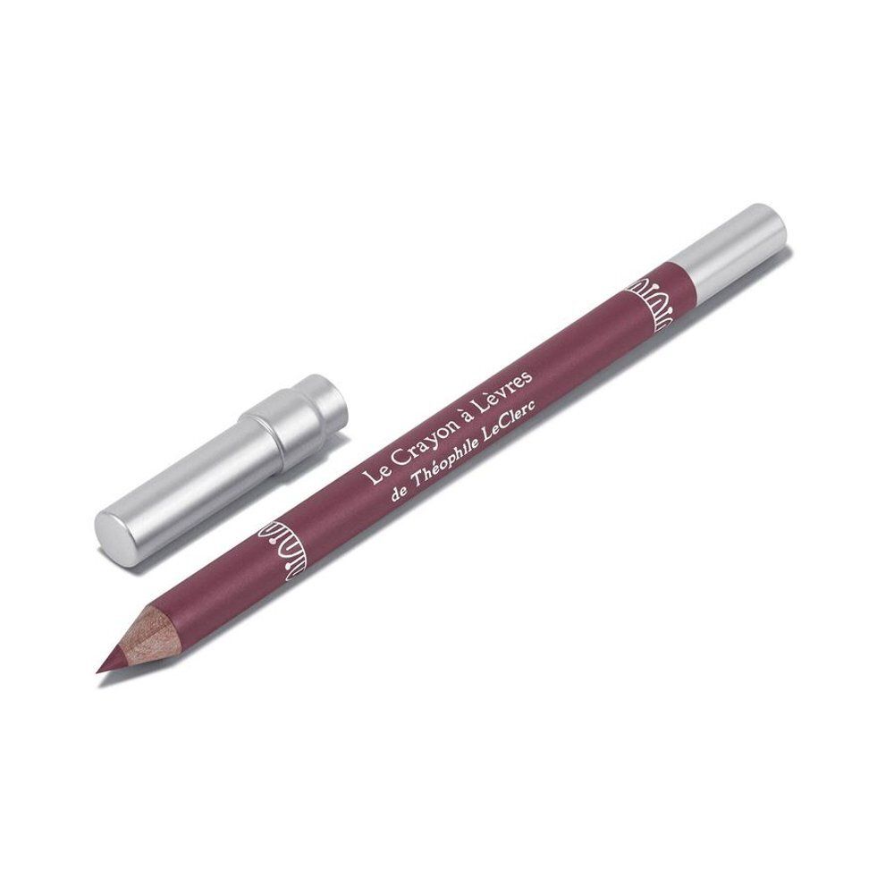 Crayon à lèvres avec capuchon argenté. Le crayon est brun-rouge. Le capuchon est à côté.