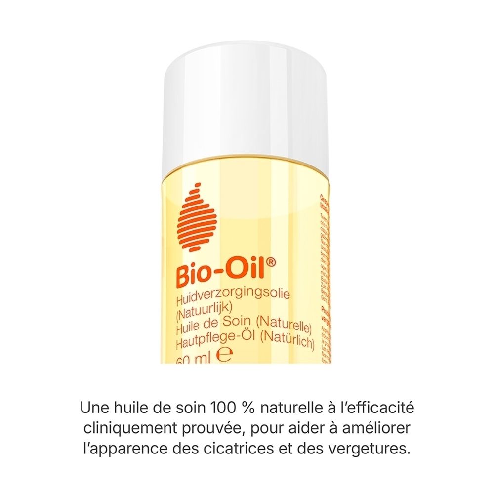Flacon Bio-Oil avec bouchon blanc, rempli d'huile jaune. Logo orange-rouge et informations produit sur l'étiquette.