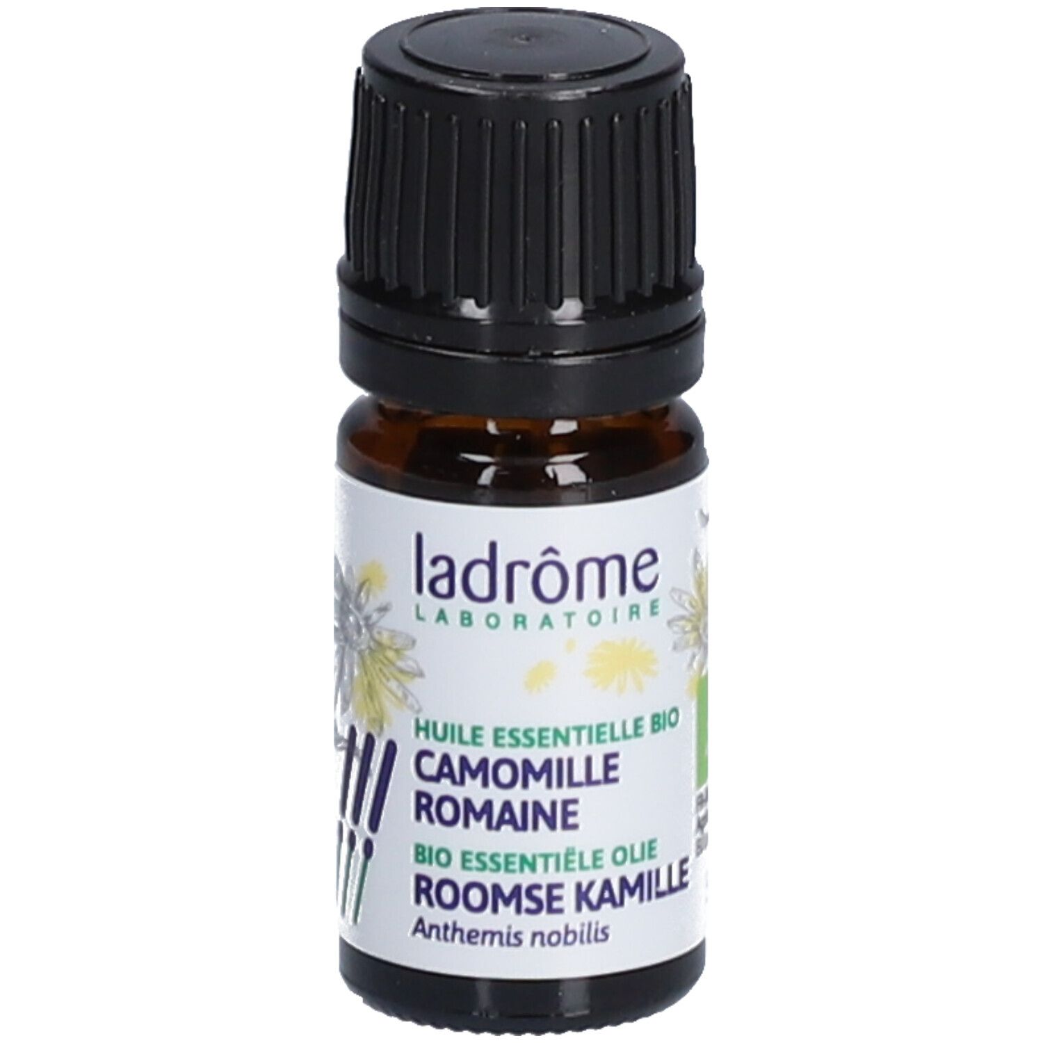 Flacon en verre brun avec bouchon noir. Étiquette avec texte: Ladrôme, Huile Essentielle Bio Camomille Romaine.