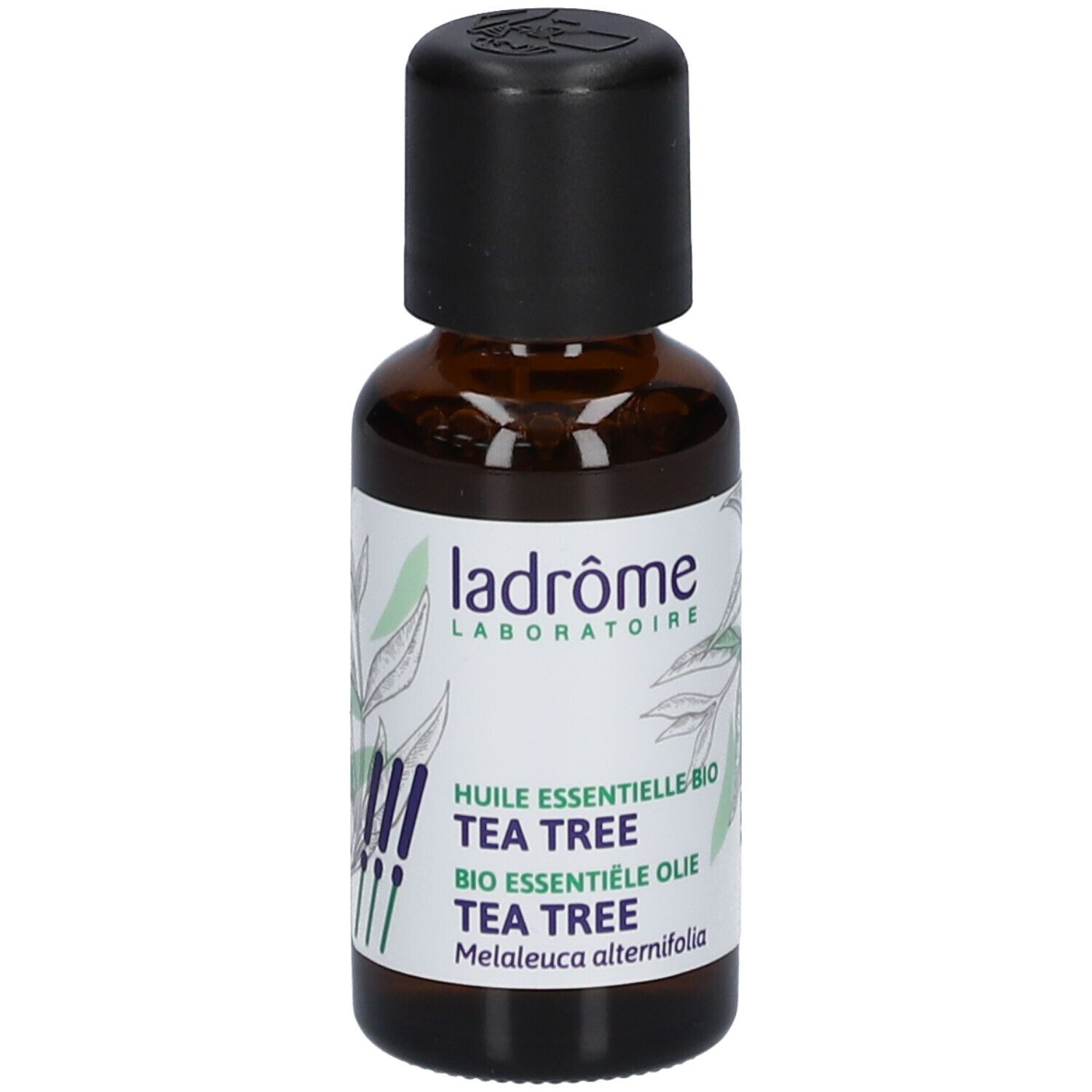 Flacon en verre brun avec bouchon noir. Étiquette "ladrôme" et "TEA TREE".