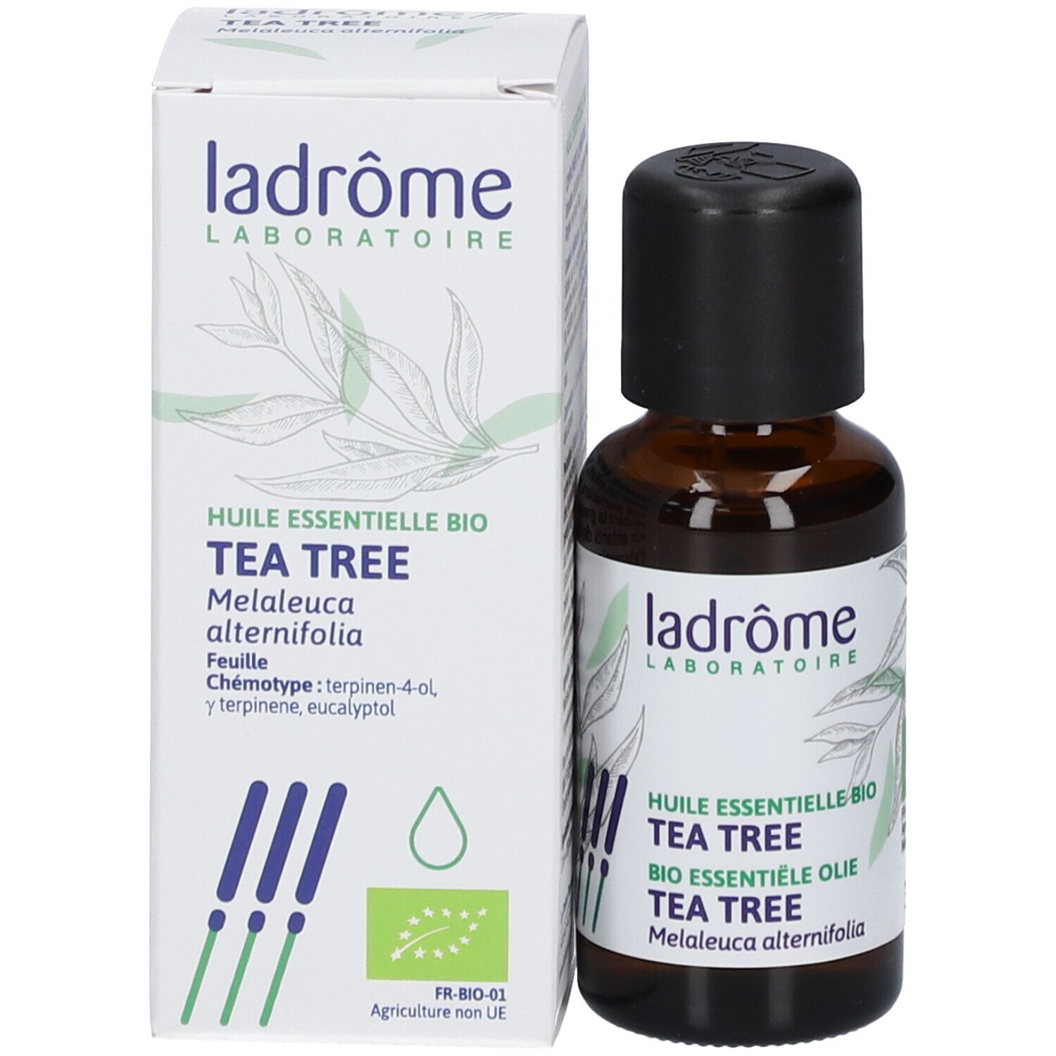 Flacon en verre brun et carton. Flacon avec bouchon noir, étiquette "ladrôme" et "TEA TREE".