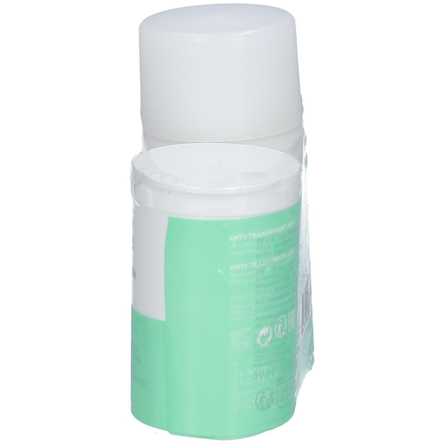 Zwei weiße Roll-On-Deos mit grüner Verpackung. Aufschrift: SVR, Spirial. Verpackt.