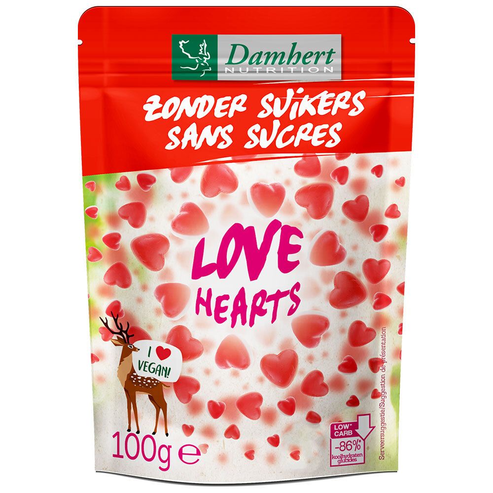 Bonbons rouges en forme de cœur dans un emballage rouge et blanc. Inscription : Love Hearts, Zonder Suikers, Sans Sucres. Vegan.