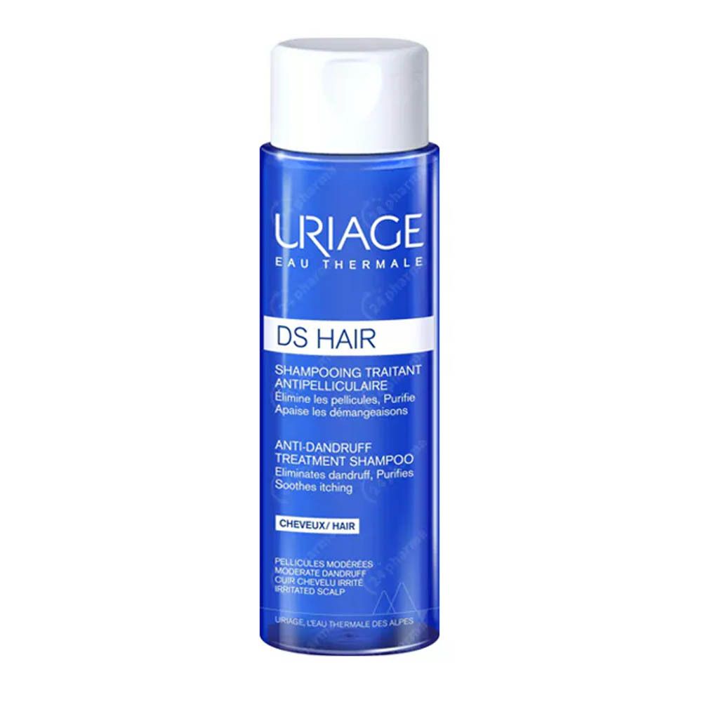 Flacon bleu Uriage DS Hair. Bouchon blanc. Texte: DS Hair, Shampooing Traitant Antipelliculaire.