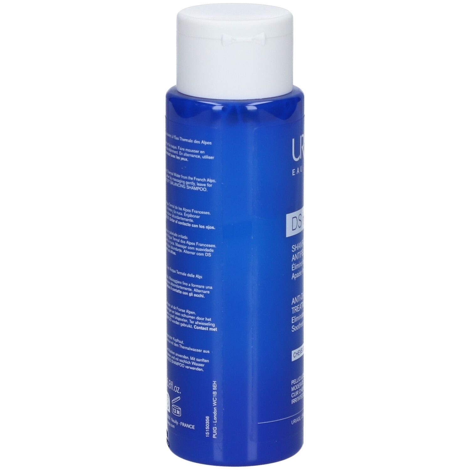 Rückseite der blauen Flasche Uriage DS Hair Shampoo. Text in mehreren Sprachen. Weißer Deckel.