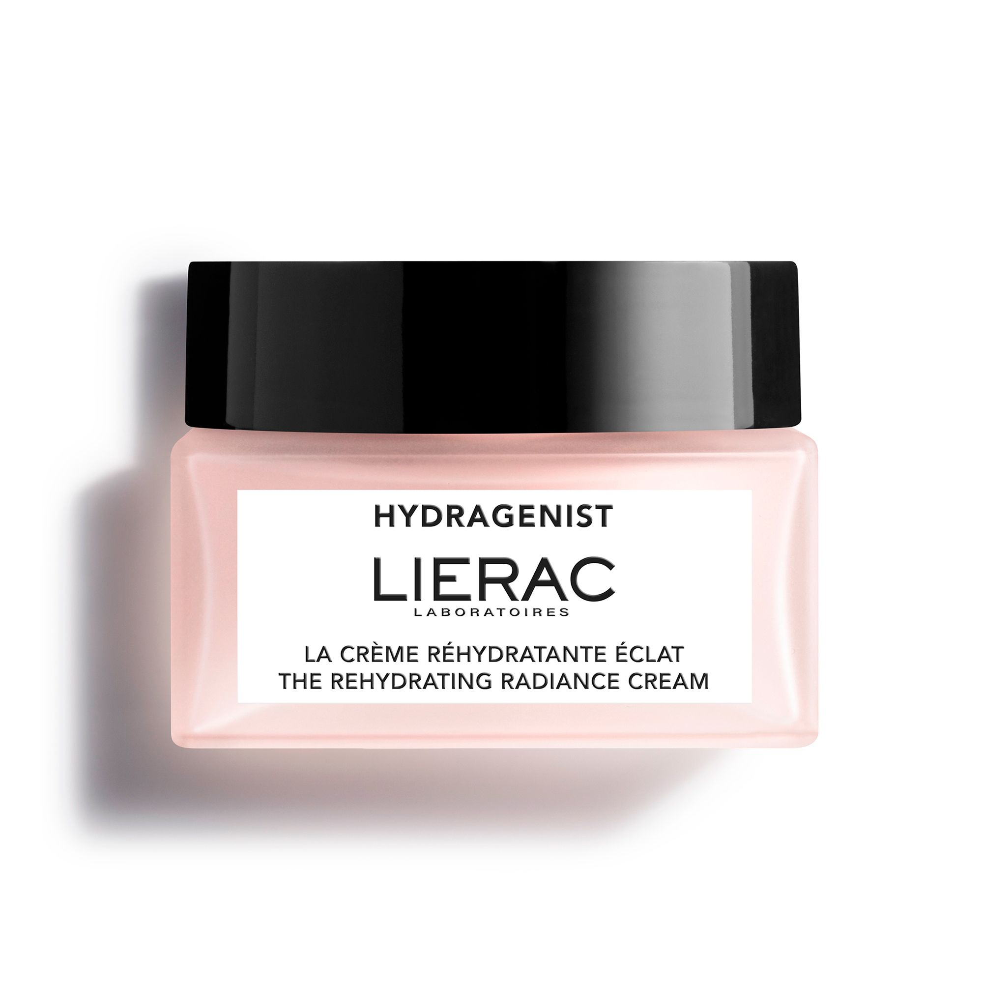 Pot de crème avec couvercle noir. Étiquette : HYDRAGENIST, LIERAC, LA CRÈME RÉHYDRATANTE ÉCLAT, THE REHYDRATING RADIANCE CREAM.