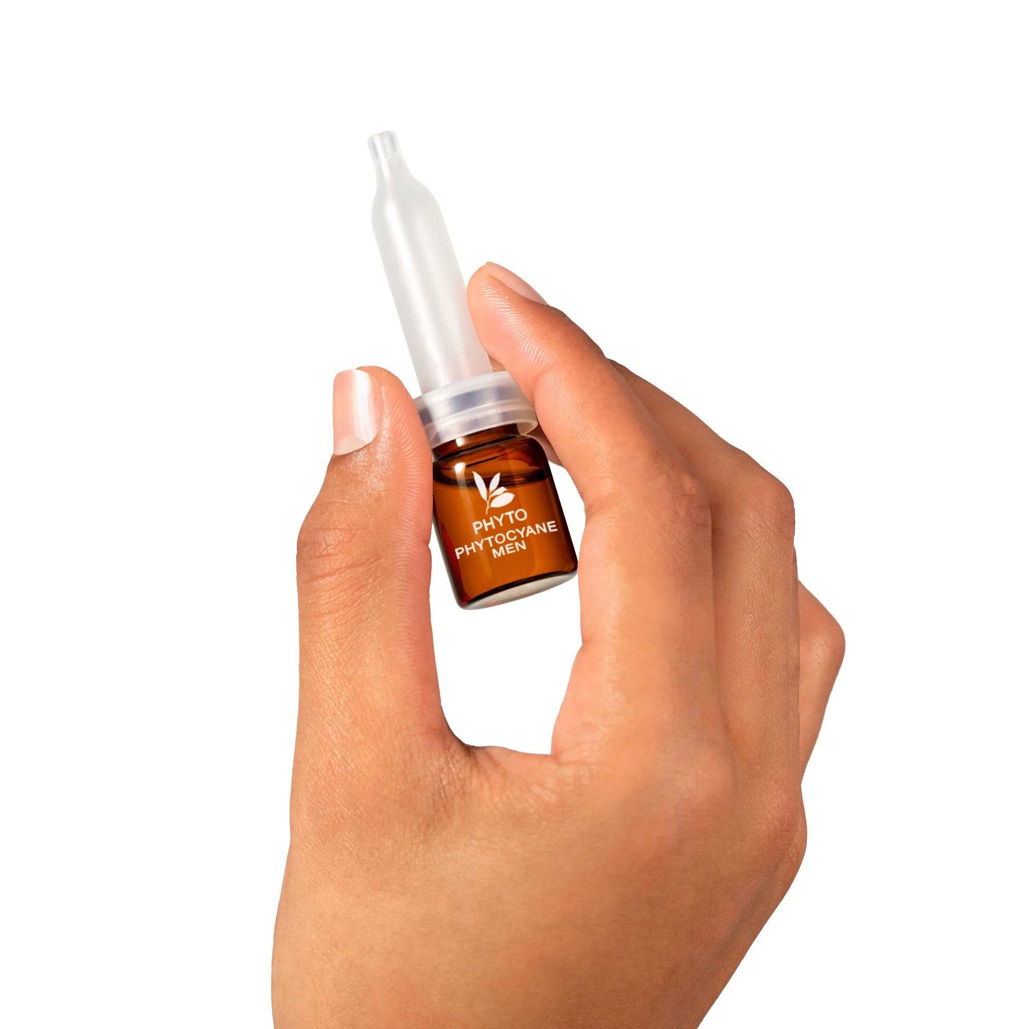 Ampoule tenue dans une main. Inscription : PHYTO, PHYTO-CYANE-MEN.