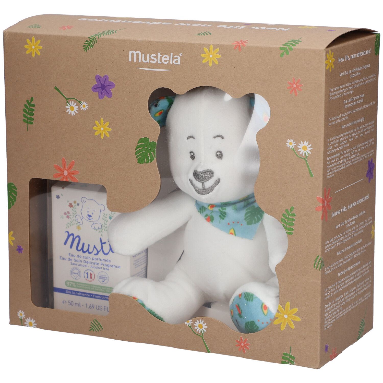 Coffret cadeau avec ours en peluche et flacon. Ours avec foulard et pieds bleus. Flacon avec logo et texte. Emballage floral.