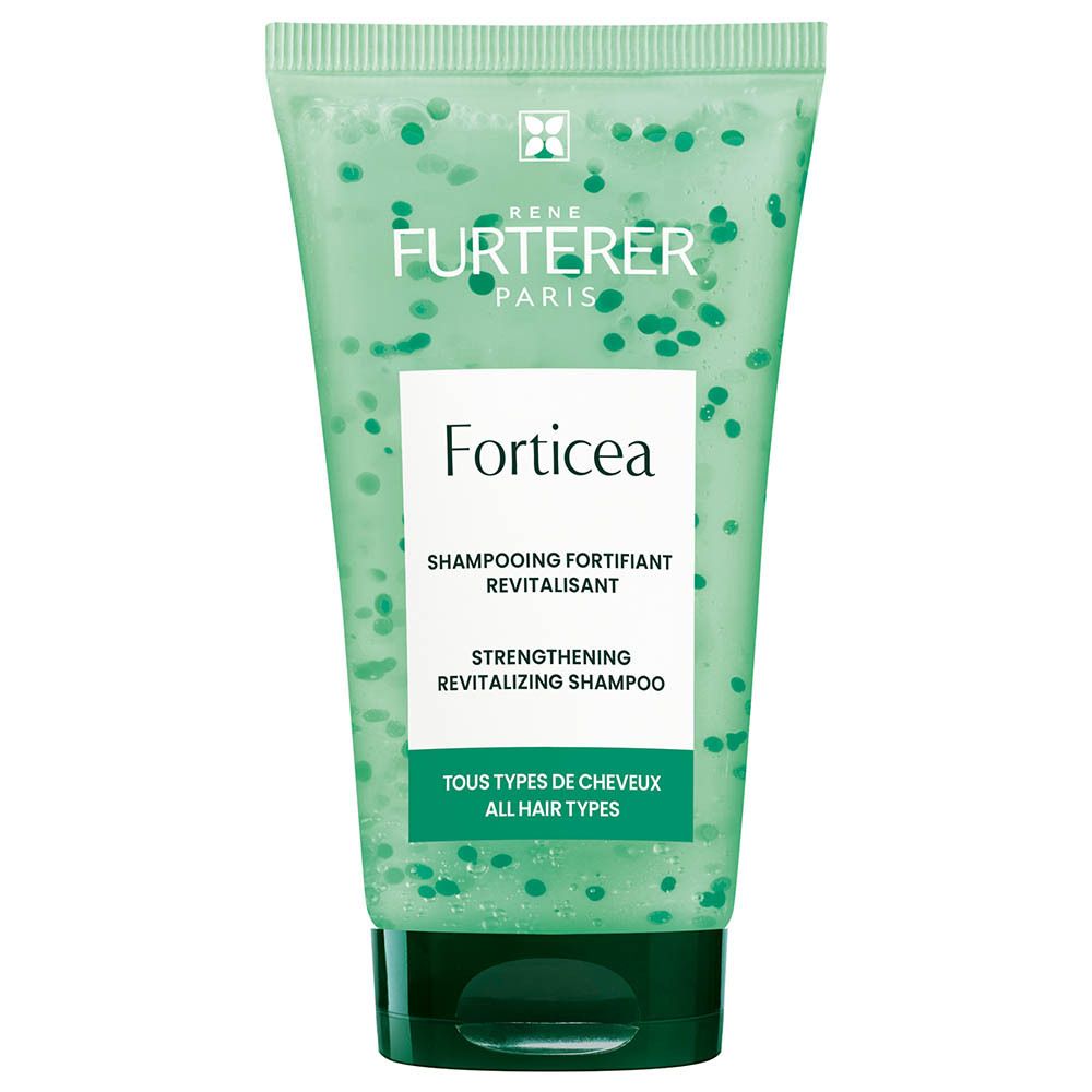 Grüne Tube mit Rene Furterer Forticea Stärkendem Revitalisierendem Shampoo. Transparenter Gel-Inhalt mit grünen Kügelchen.