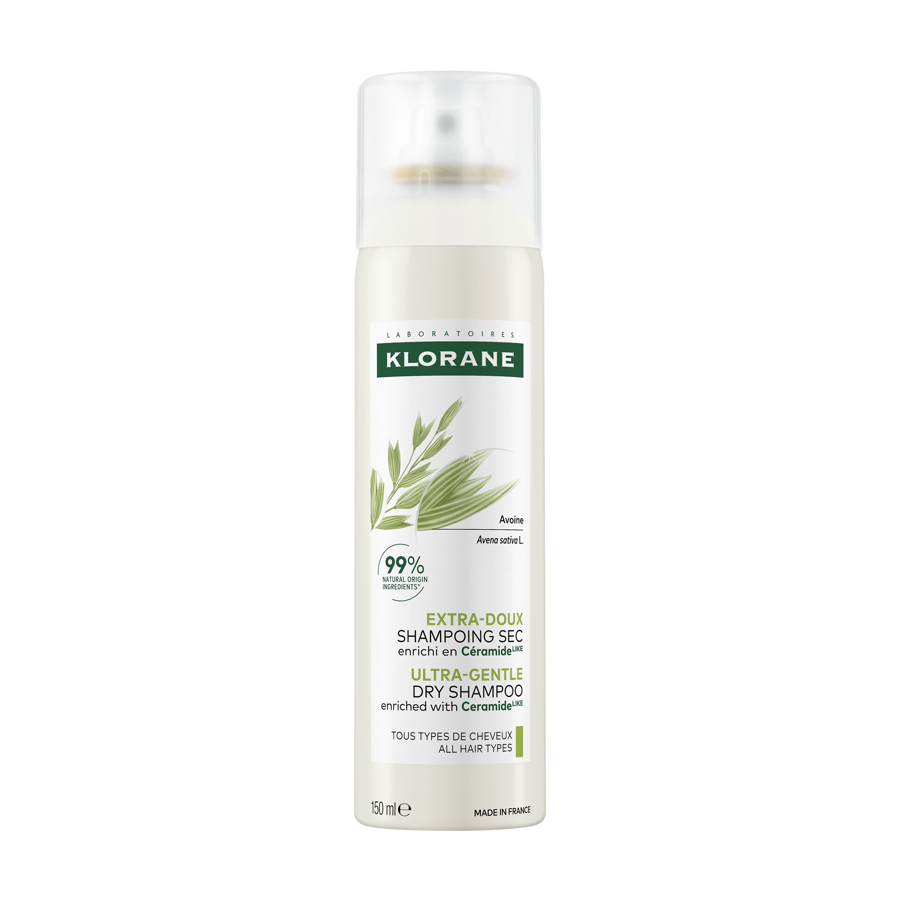 Spray de shampooing sec KLORANE. Flacon blanc avec étiquette verte. Contient de l'avoine et des céramides.