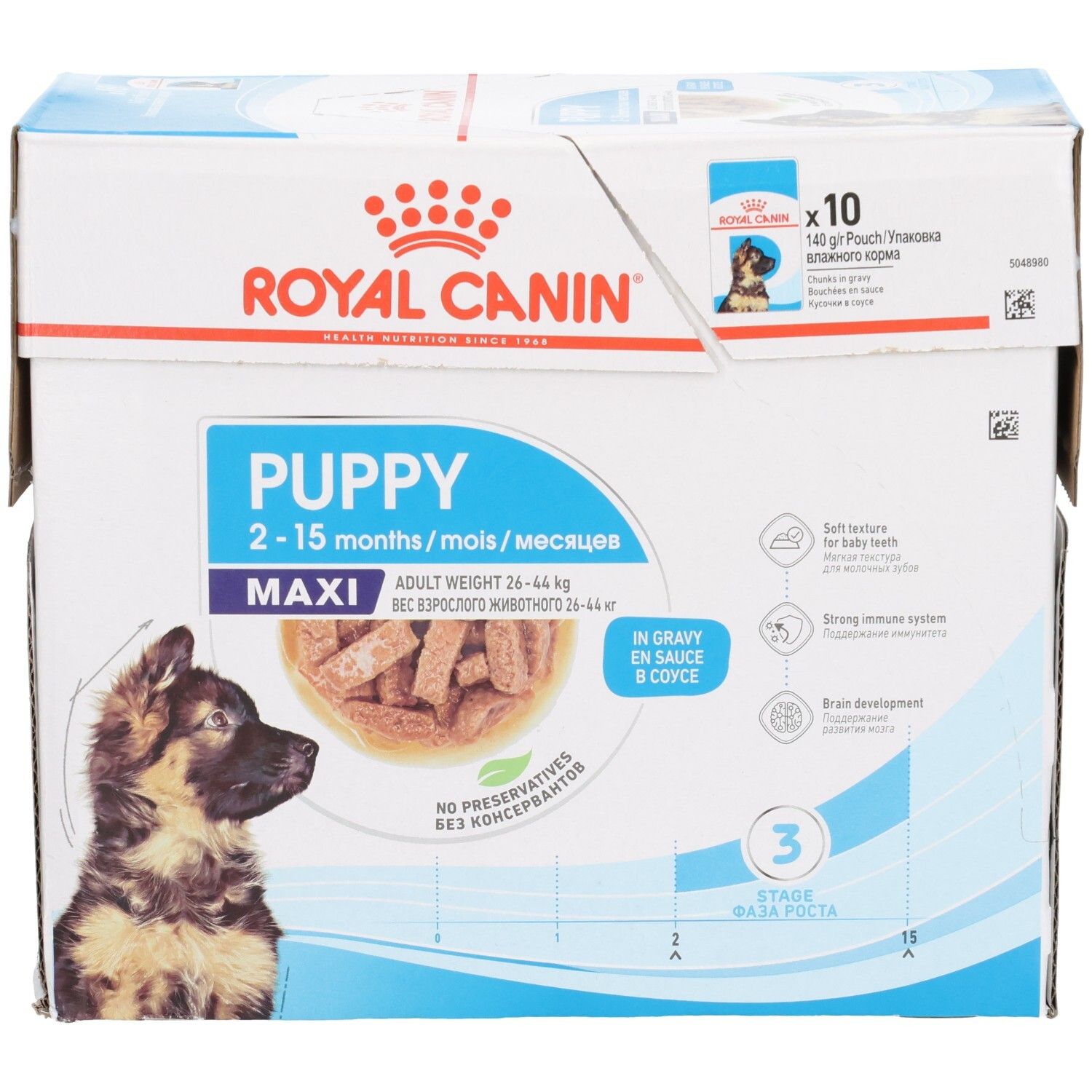 Royal Canin Maxi Puppy in Soße, 10x140g Beutel. Vorderseite der Kartonverpackung mit Welpenbild und Produktmerkmalen.