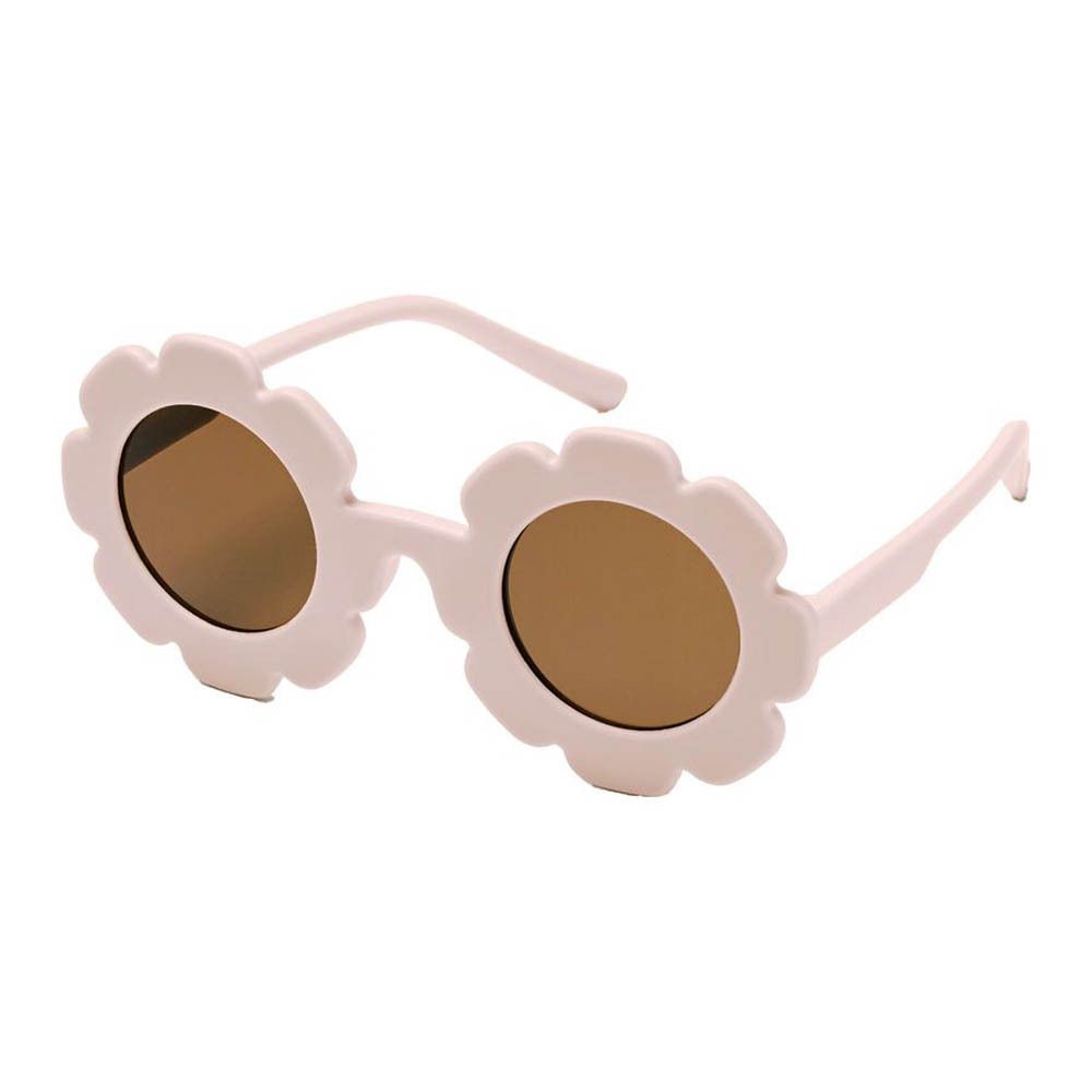 Lunettes de soleil roses pour enfants, verres en forme de fleur, verres bruns. Le nom de la marque est visible sur la branche.
