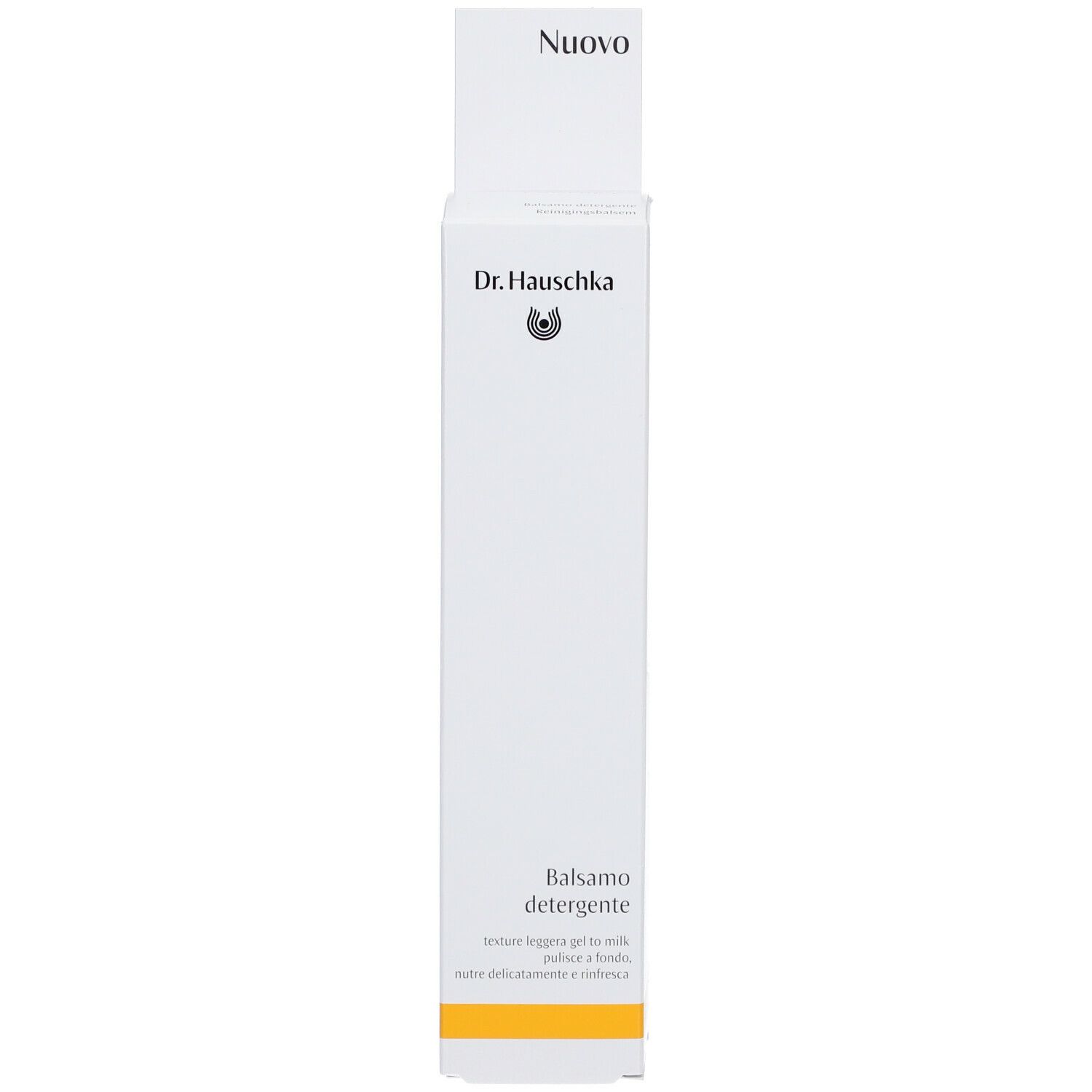 Emballage blanc. Inscription: Dr. Hauschka, Balsamo detergente. 'Nuovo' en haut. Bande jaune en bas.