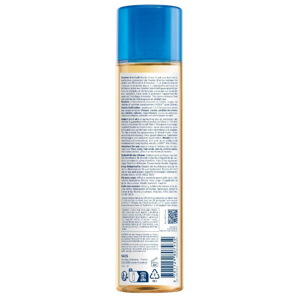 Dos du flacon d'huile Bioderma. Texte avec ingrédients et instructions. Code QR et symboles de recyclage.