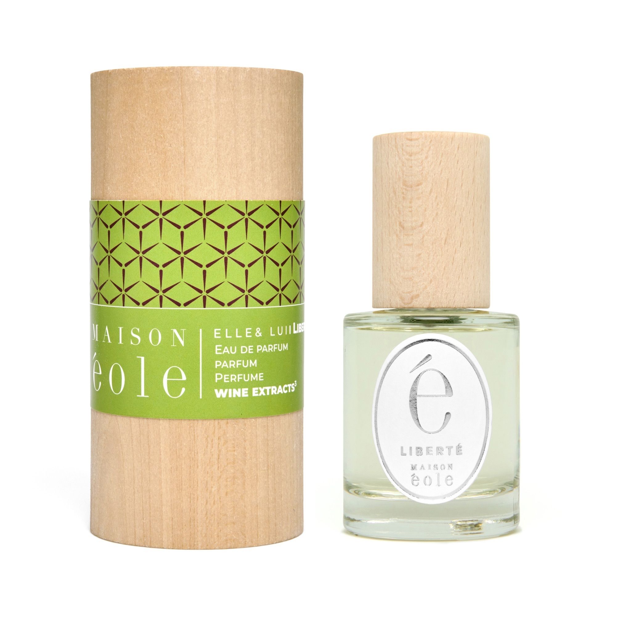 Flacon de parfum à côté d'un emballage cylindrique. L'emballage indique "Maison Éole".