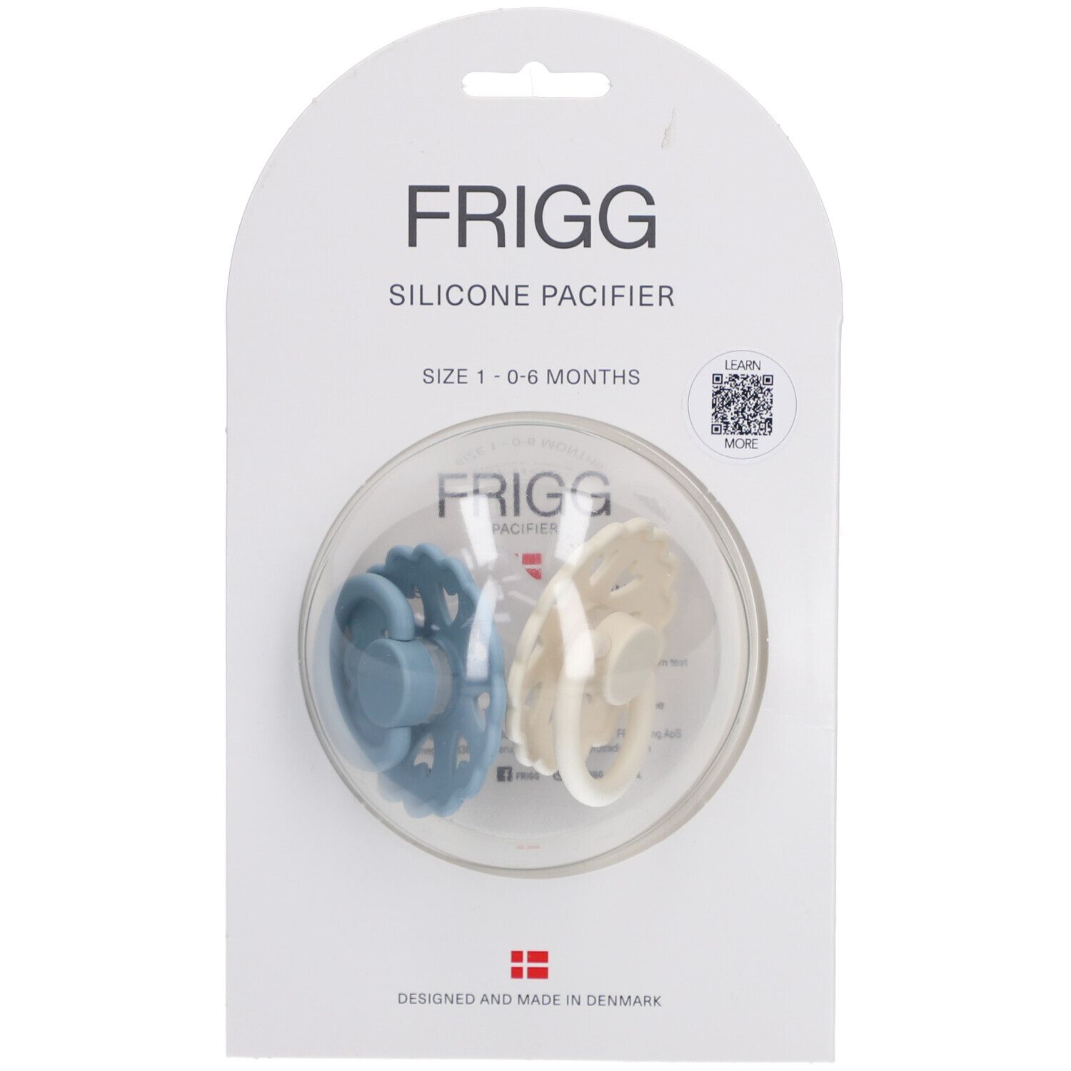 Zwei Schnuller in Verpackung. Blau und cremefarben. Marke FRIGG. Größe 0-6 Monate. Silikon-Schnuller.