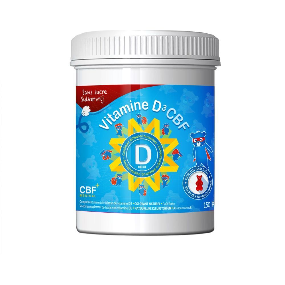 Boîte blanche avec étiquette bleue. Inscription: Vitamine D3 CBF, Sans sucre. Illustration d'ours.
