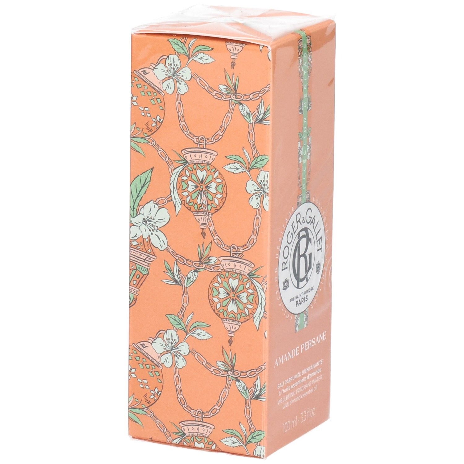 Kartonverpackung von Roger & Gallet Amande Persane. Pfirsichfarbener Karton mit floralem Muster und Logo.