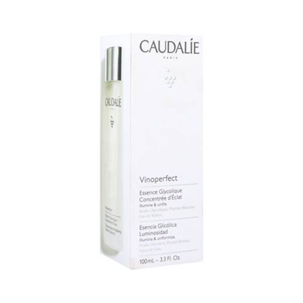 Flacon et emballage. Inscription Caudalie, Vinoperfect Essence Glycolique. Emballage : blanc avec texte bleu.