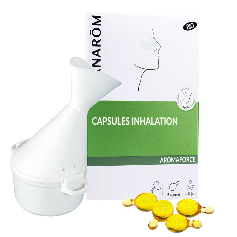 Inhalateur et capsules. Appareil d'inhalation blanc, boîte verte et blanche avec capsules. Capsules jaunes.