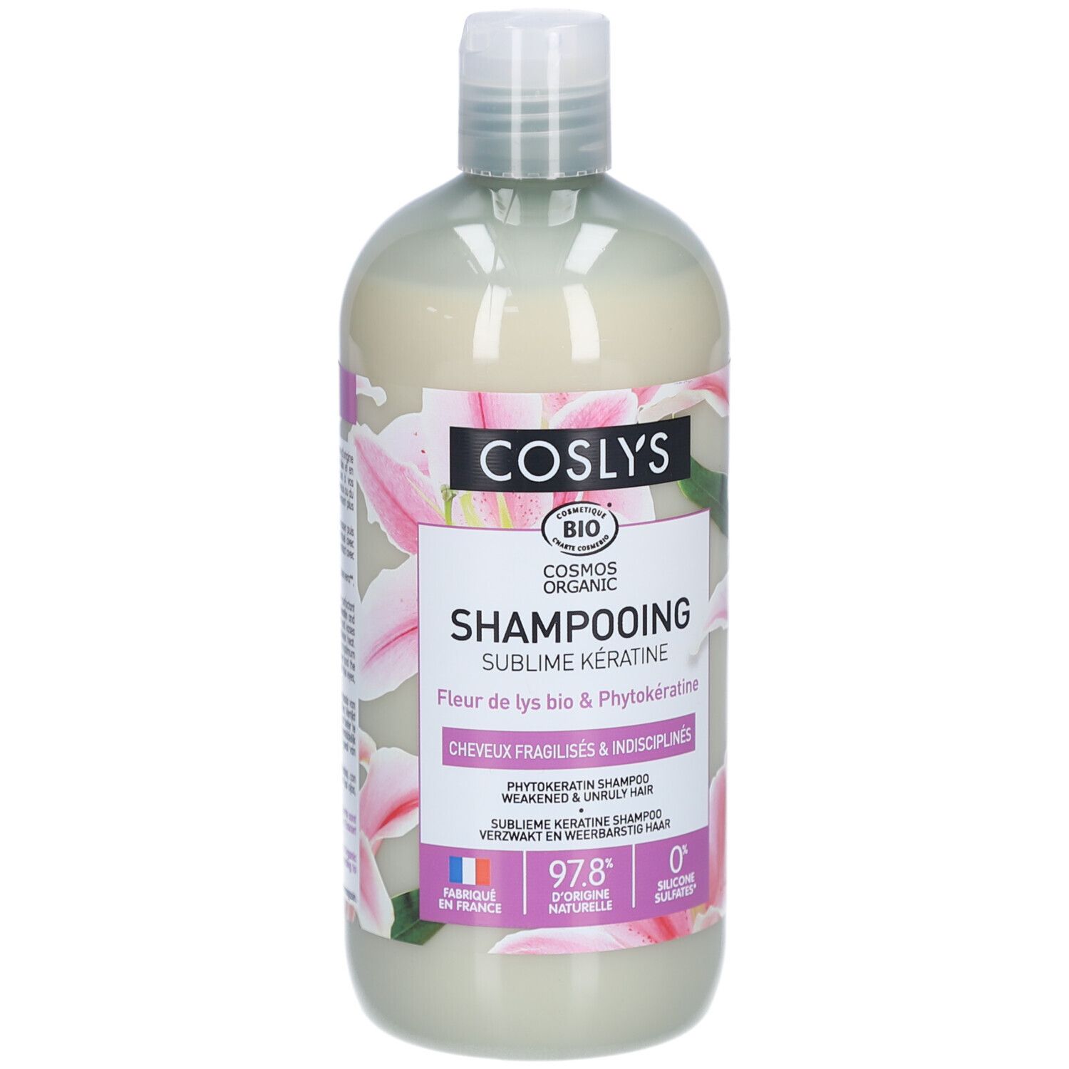 Shampooing-Flasche mit weißem Inhalt. Aufschrift: Coslys, Shampooing Sublime Kératine. Mit Bio-Siegel und Blumenmuster.