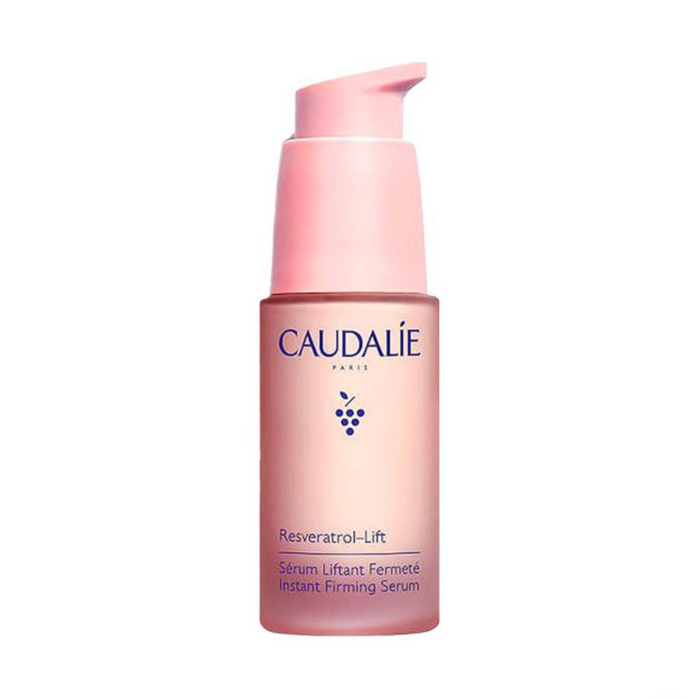 Sérum Caudalie Resveratrol-Lift. Flacon avec pompe rose. Inscriptions: Caudalie, Resveratrol-Lift, Sérum Liftant Fermeté.