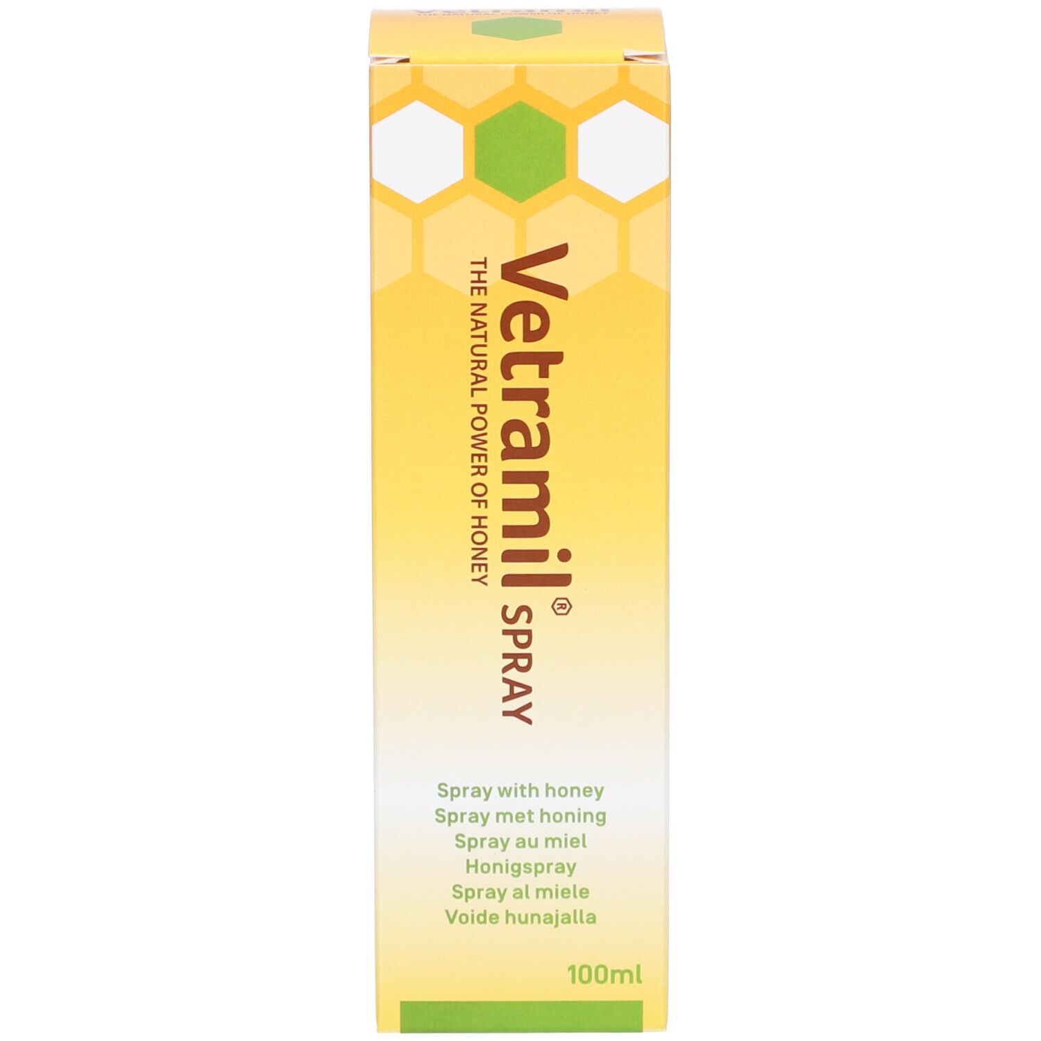 Karton mit gelb-weißem Bienenwabenmuster. Aufschrift: Vetramil Spray, Honig. Mehrsprachige Produktinformationen.