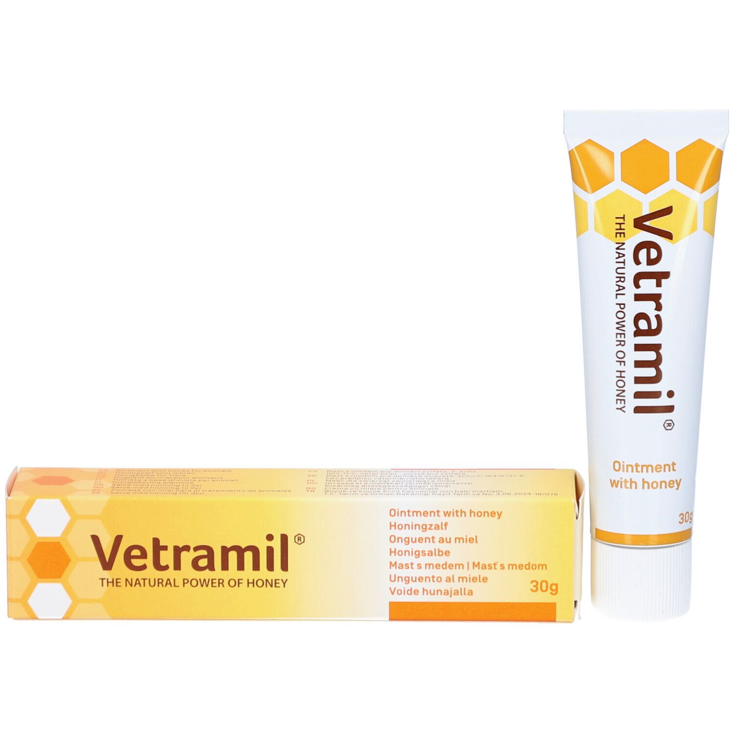 Vetramil Creme-Tube und Schachtel. Tube und Schachtel mit gelben Akzenten. Aufschrift: Ointment with honey.