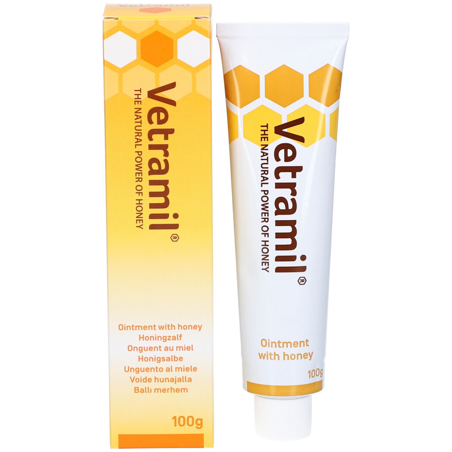 Tube und Schachtel. Schachtel gelb mit Honigwaben-Design. Aufschrift: Vetramil, Ointment with honey. 100g.