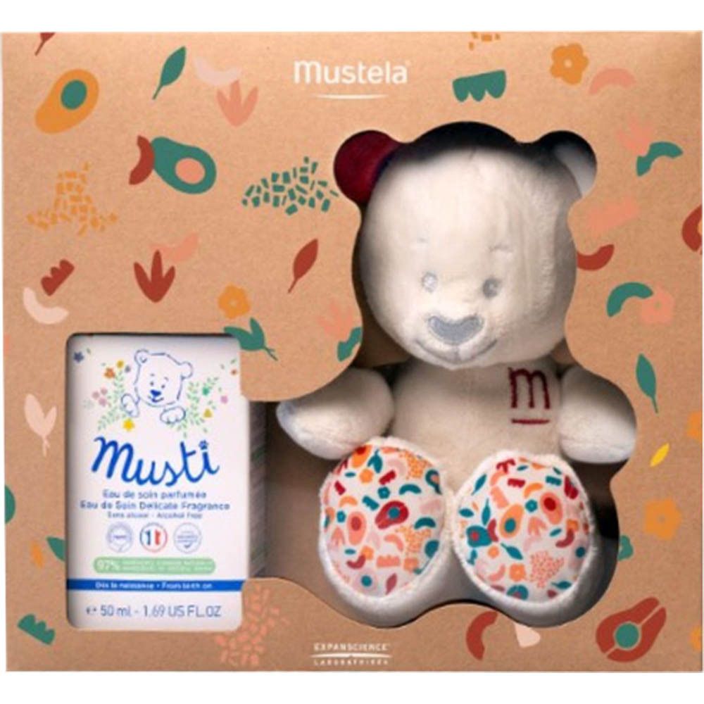 Coffret Mustela avec peluche ours et eau parfumée, vue de face.