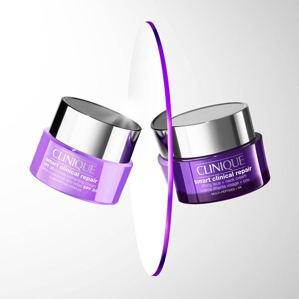 Zwei Clinique Smart Clinical Repair Tiegel in Lila und Violett, einer mit SPF 30.