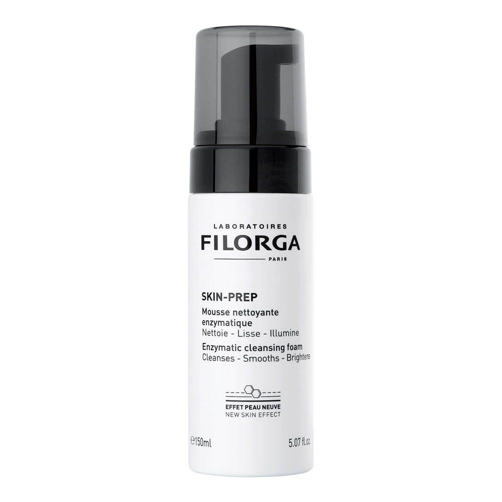 Filorga Skin-Prep Reinigungsschaum. Weiße Flasche mit schwarzem Pumpkopf. Marke und Produktname.
