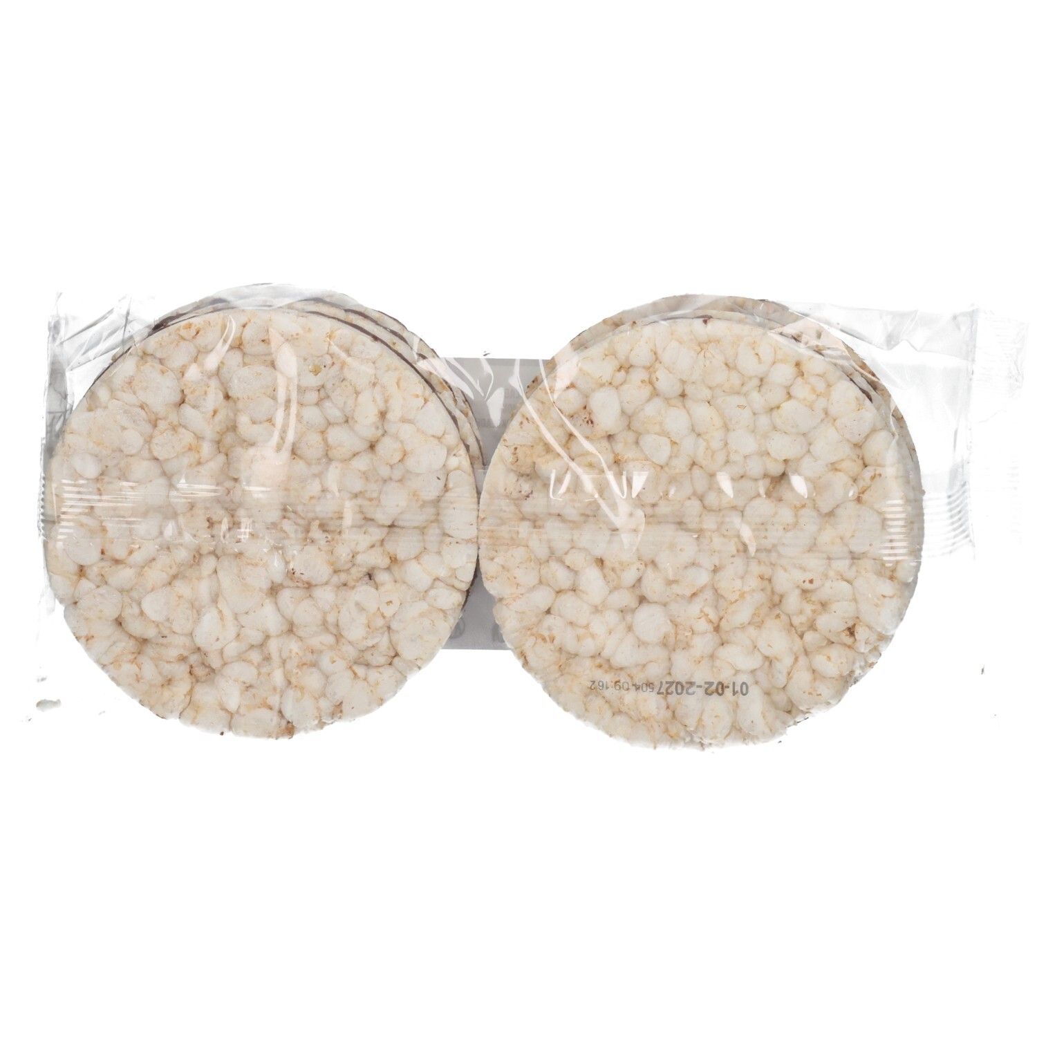 Verpackung mit Reiswaffeln. Runde, helle Waffeln in transparenter Verpackung.