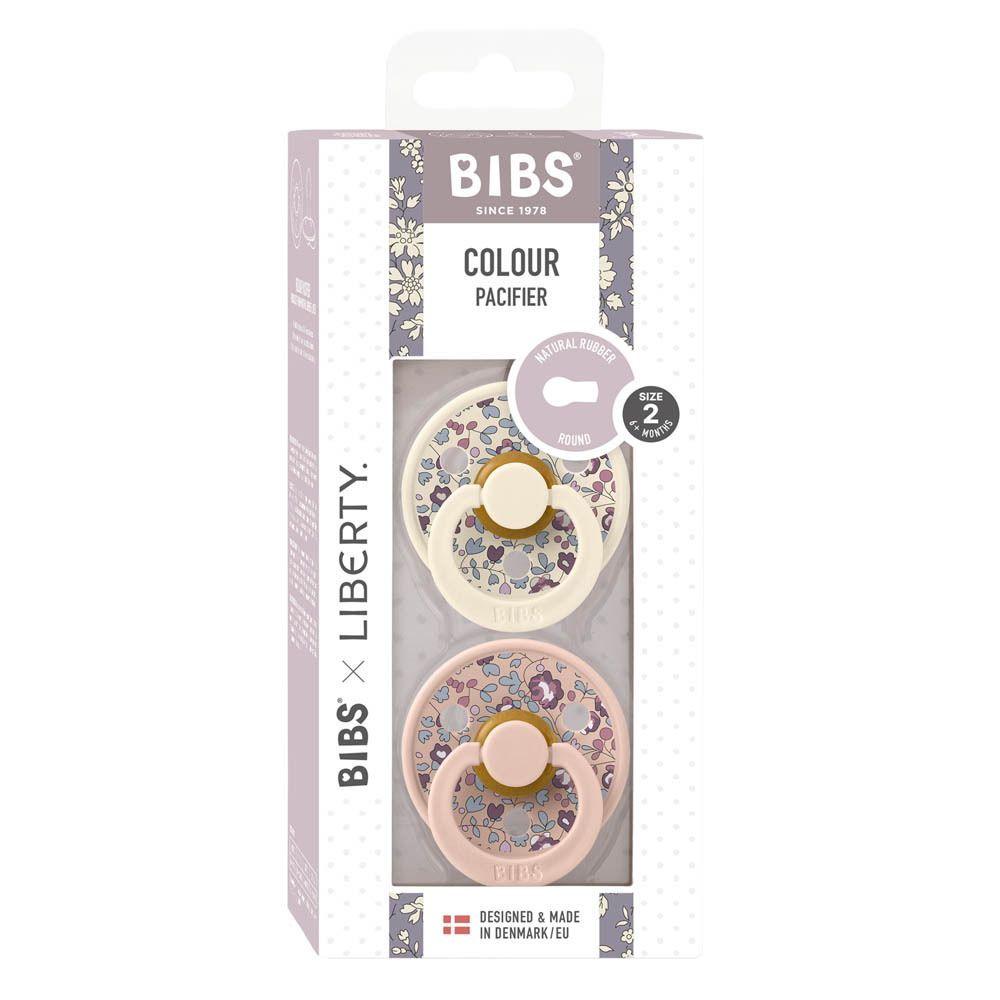 Verpackung mit zwei Schnullern. BIBS x Liberty, Größe 2. Blumenmuster, rosa und cremefarben. Sichtfenster.