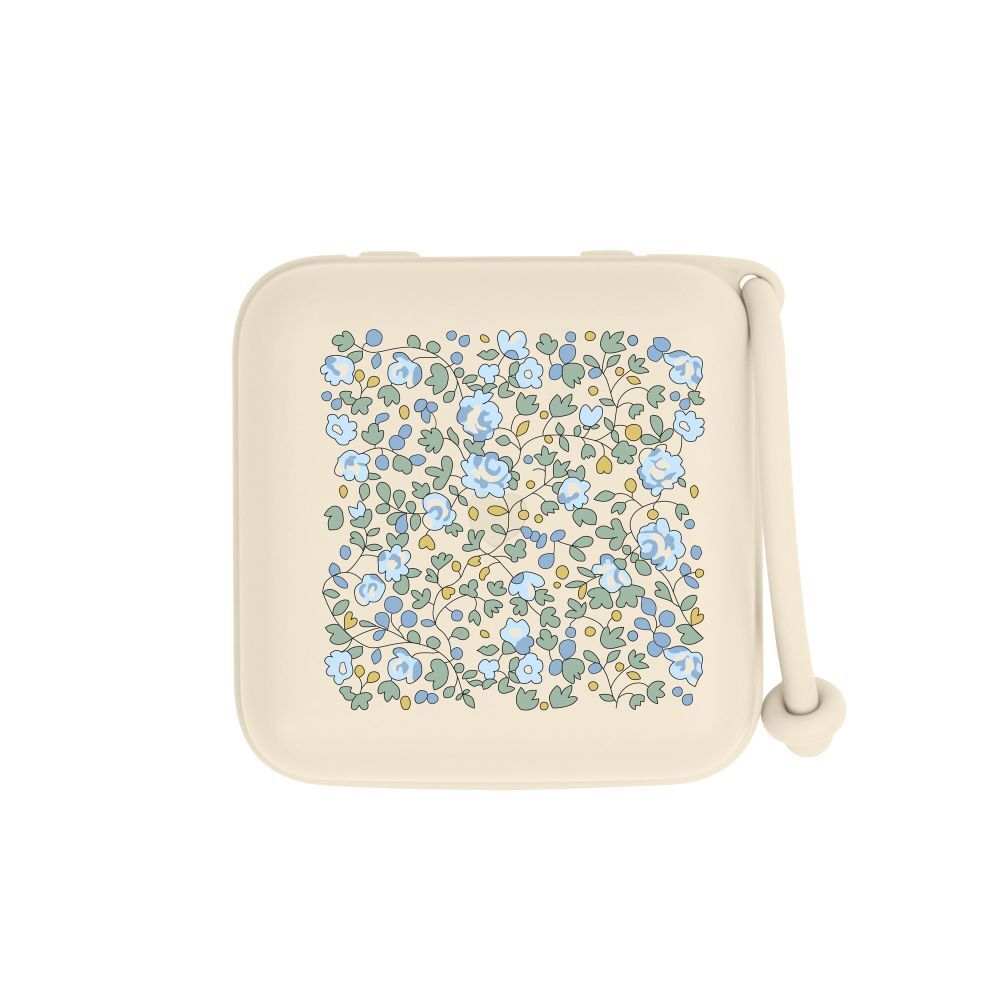 Boîte à sucette BIBS. Boîte beige avec motif floral bleu. Couvercle avec poignée.
