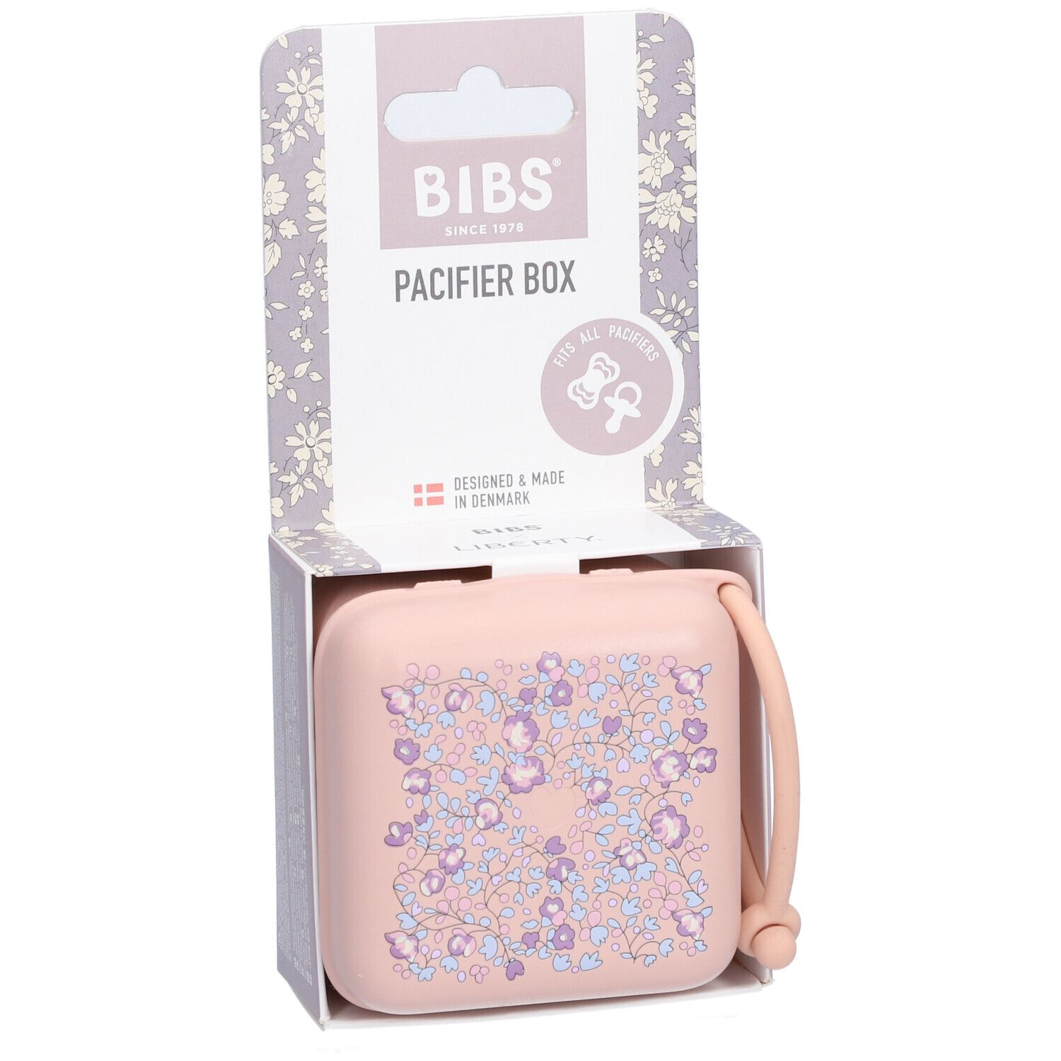 BIBS Schnullerbox Liberty Blush. Rosa Box mit Blumenmuster, in Verpackung. Mit Griff. "PACIFIER BOX" und Logo.